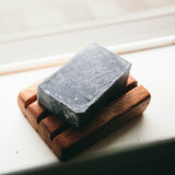 Manly Activated Charcoal Olive Soap on Redwood soap dish