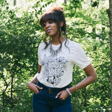 Woman wearing Love Botanical Shirt for Preemptive Love Coalition - Woman's Fashion & Style