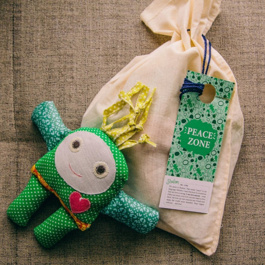 beautiful green peace doll great gift for kids in cotton bag with door hanger